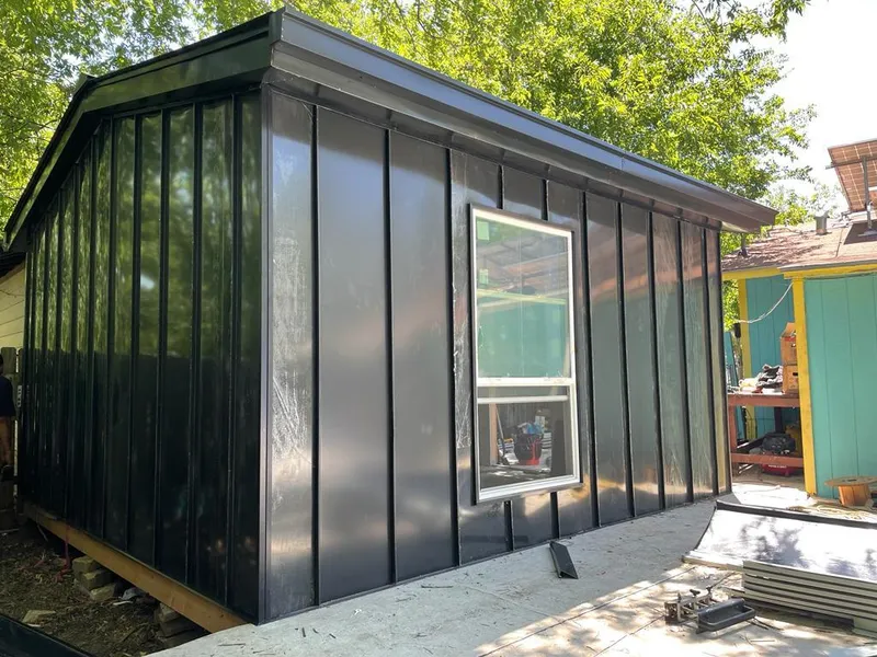 Black standing seam metal wall panels for Roof Inspection in Meadow Lakes